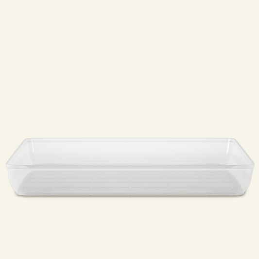 Empty clear plastic rectangular tray on cream background, square clear plant pot saucer