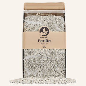 Bag of white perlite granules with spilled pile, bulk perlite