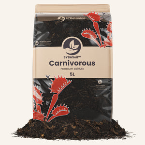 Bag of dark carnivorous plant soil mix with spilled soil