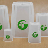 Several clear plastic plant pots with green leaf logo